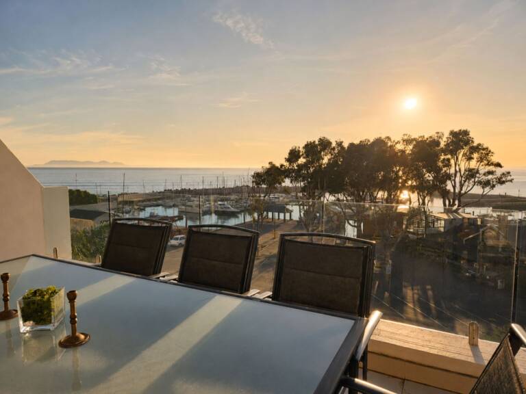24 gordonia gordons bay 19 sunset view of harbour with outdoor dining 1 768x576
