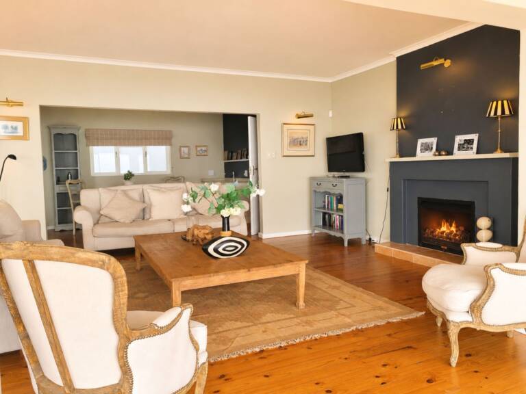 amazing view villa gordons bay 08 luxury living room with fire place 768x576