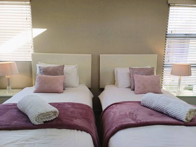 antilles on the beach gordons bay 33 twin bedroom with natural light 768x576