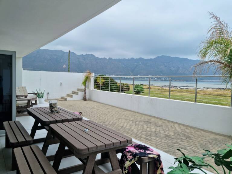 antilles on the beach gordons bay 48 beach front patio with dining 768x576
