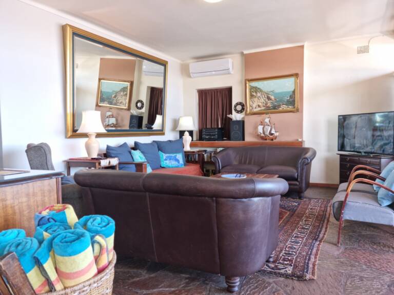 bikini beach holiday home gordons bay 16 living room with balcony access 768x576