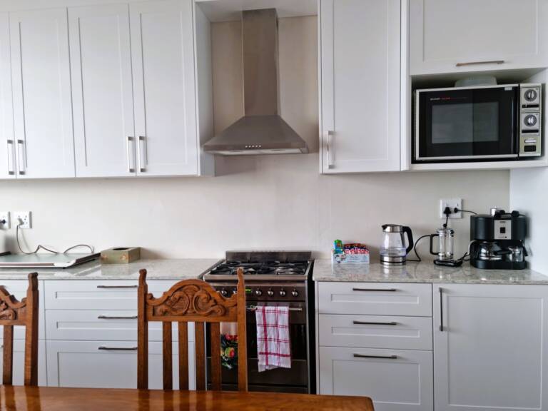 bikini beach holiday home gordons bay 23 farm style kitchen with sea view 768x576