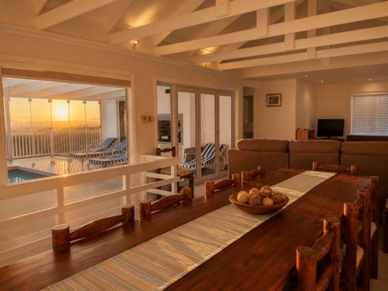 bolussi house gordons bay 05 dining table with pool and ocean views 768x576