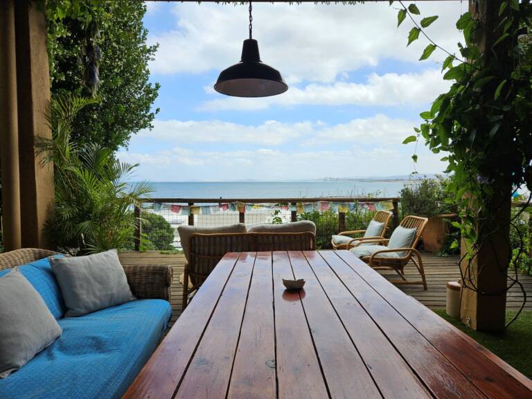 cardamom cottage gordons bay 21 patio with dining and sea view 768x576