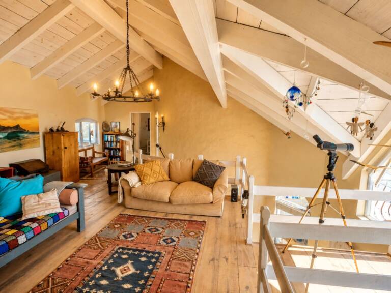cardamom house gordons bay 23 mezzanine reading loft with comfortable furniture 768x576