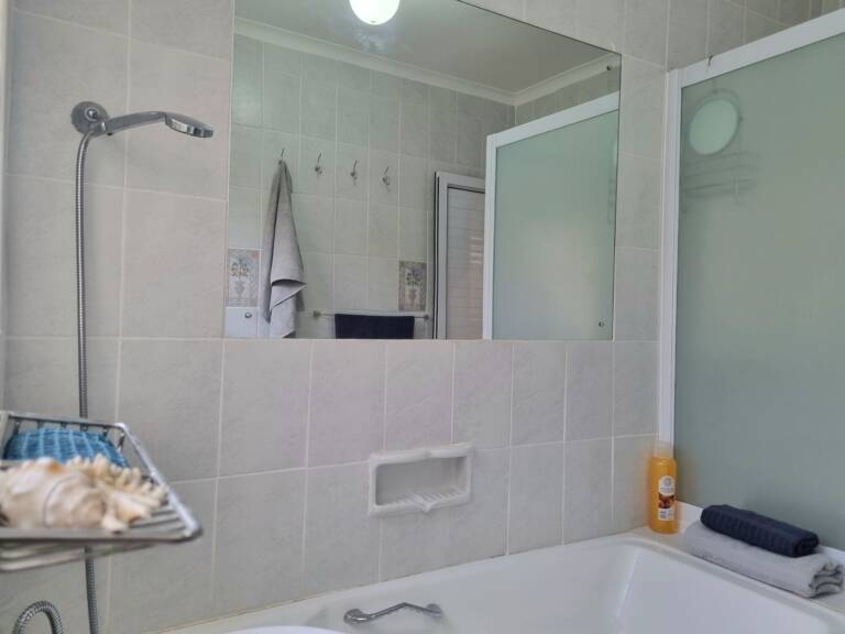 country beach house gordons bay 23 bathroom with bath and shower 768x576