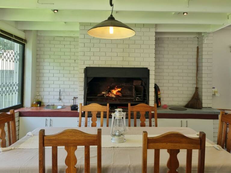 country beach house gordons bay 27 indoor braai with dining table 768x576
