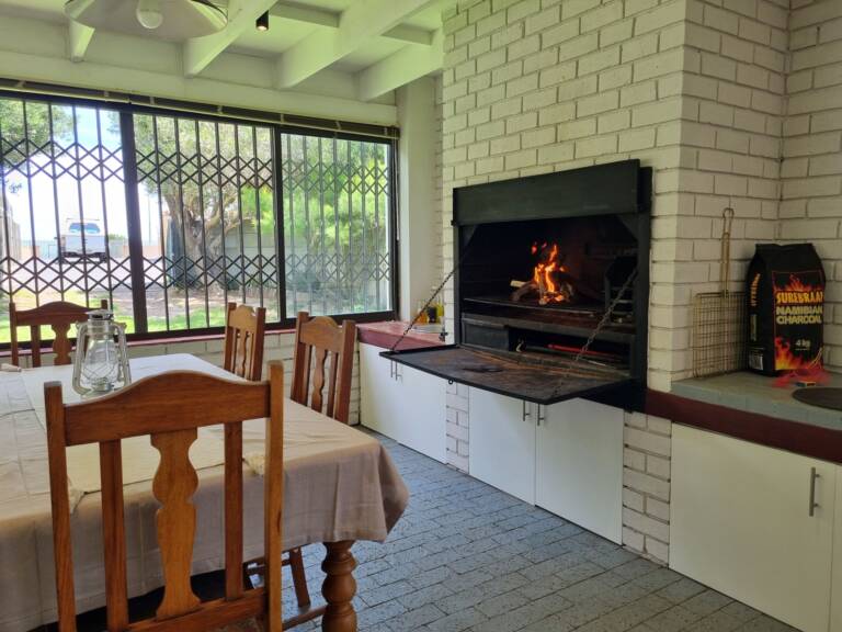 country beach house gordons bay 28 indoor braai with garden view 768x576