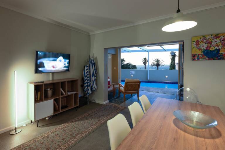 die badhuis gordons bay 22 dining area with pool and sea views 768x513