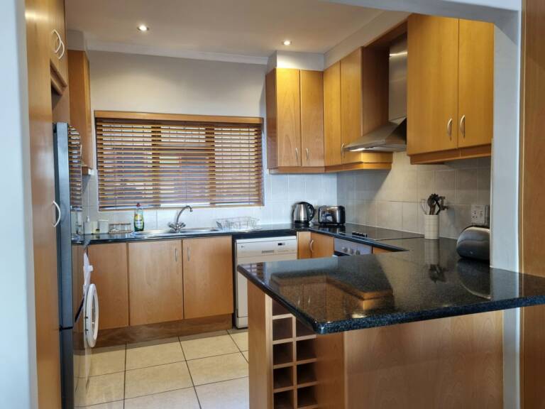 flat9 summer place gordons bay 09 kitchen with modern appliances 768x576