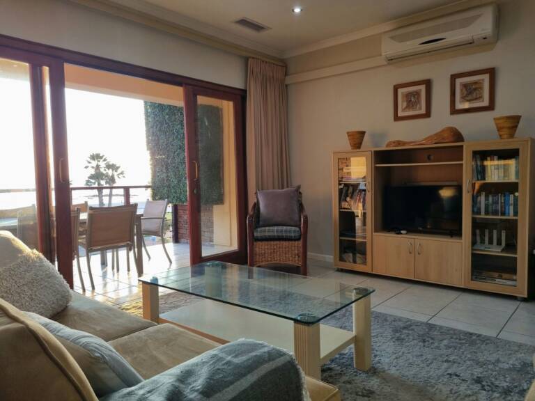 flat9 summer place gordons bay 24 lounge with tv area 768x576