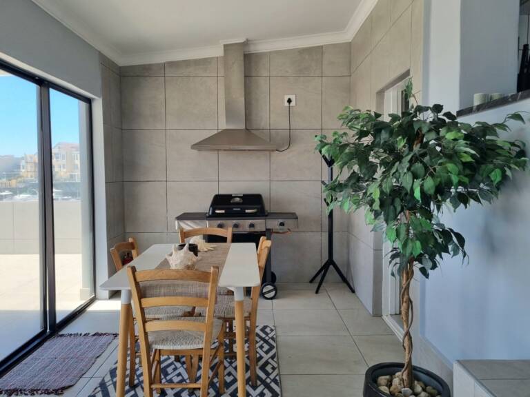 harbour place gordons bay 20 open plan living with kitchen and dining 768x576