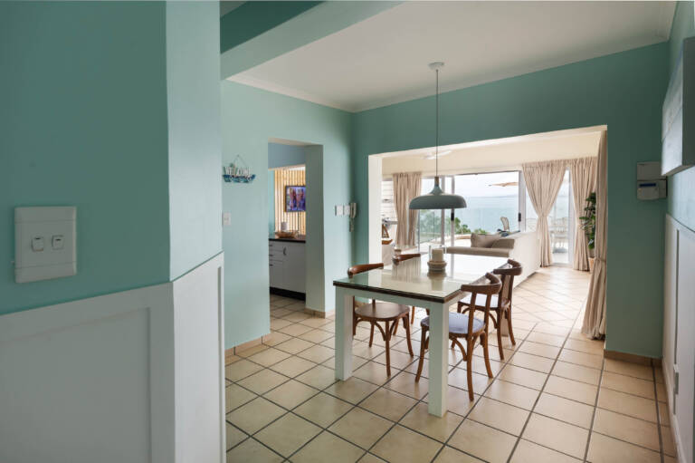 harbour views gordons bay 08 open plan living with dining table 768x511
