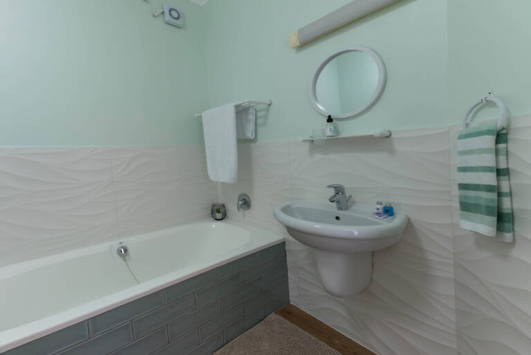 harbour views gordons bay 11 bathroom with bath and shower 768x513