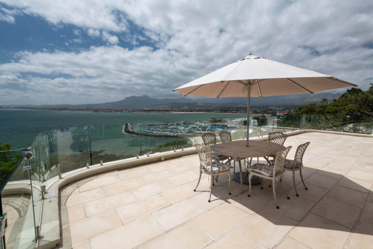 harbour views gordons bay 20 veranda with dining and sea view 768x513