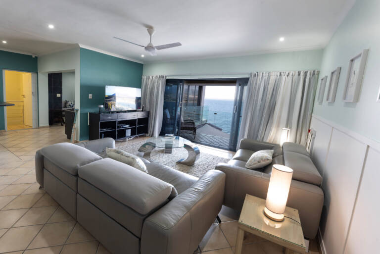ocean views gordons bay 04 living room with balcony access 768x513