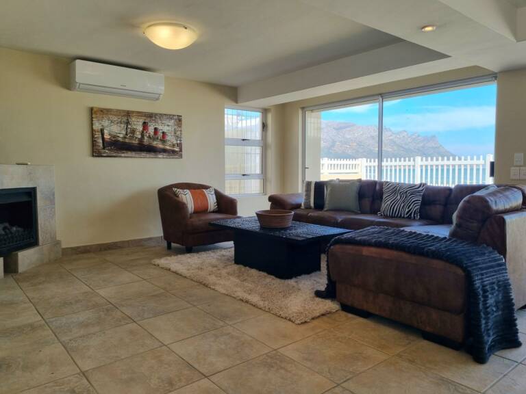 paradise tide gordons bay 05 living room with sea view 768x576