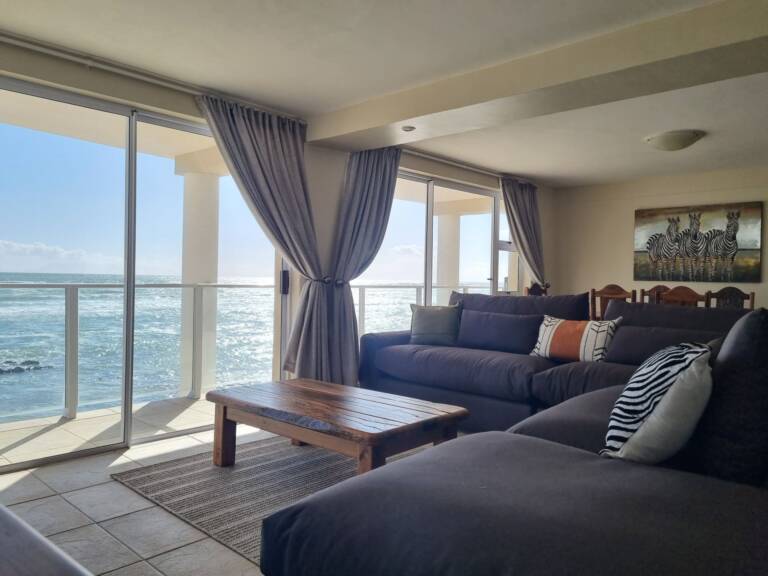paradise tide gordons bay 43 living room with sea view 768x576