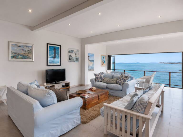seagull cove gordons bay 07.1 seating area with tv and sea view 1 768x576