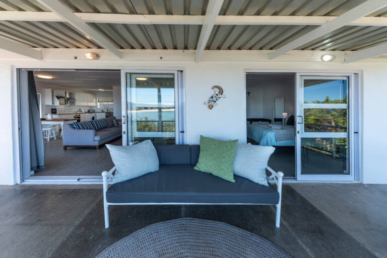 seaside cottage gordons bay 03 open plan living with balcony access 768x513