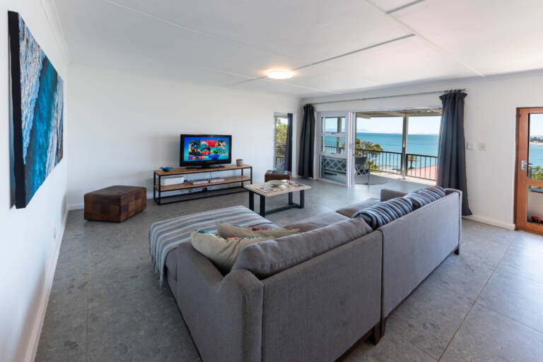 seaside cottage gordons bay 04 living room with sea view 768x513