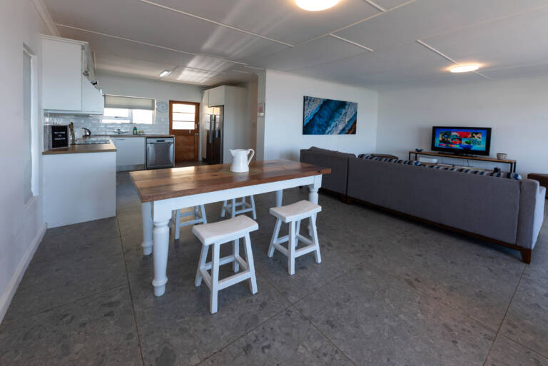seaside cottage gordons bay 05 dining area with open plan living 1 1 768x513