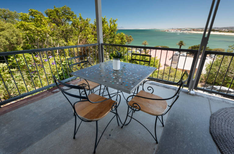 seaside cottage gordons bay 17 dining table with sea view 768x507