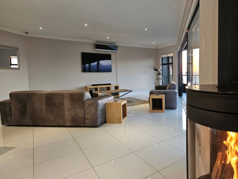 sugar beach penthouse gordons bay 10 living room with fire place 1 768x576