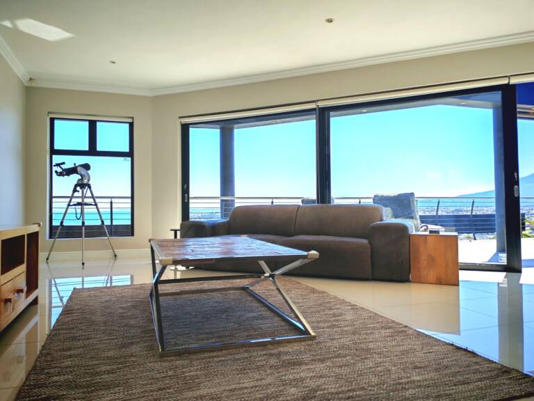 sugar beach penthouse gordons bay 13 lounge with ocean view 1 768x576