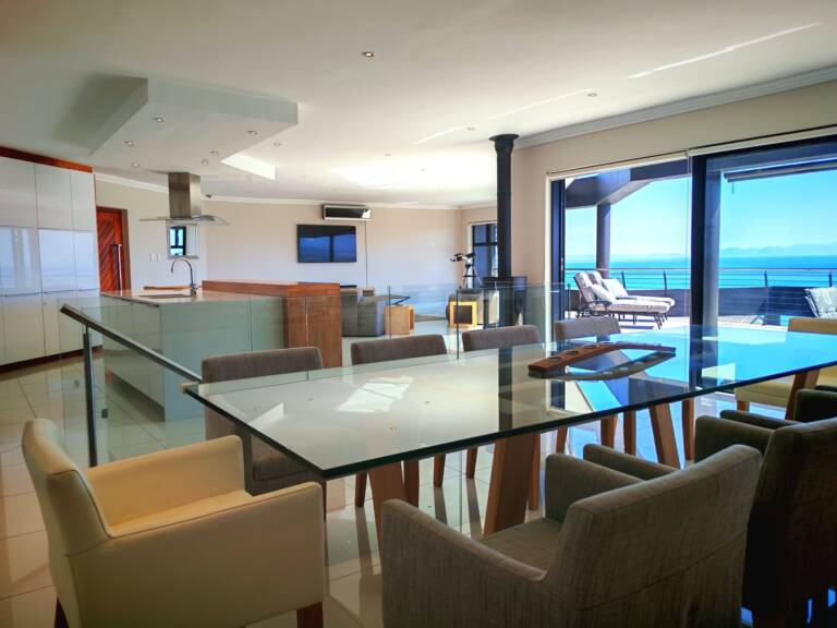 sugar beach penthouse gordons bay 23 open plan living with dining table 1 768x576