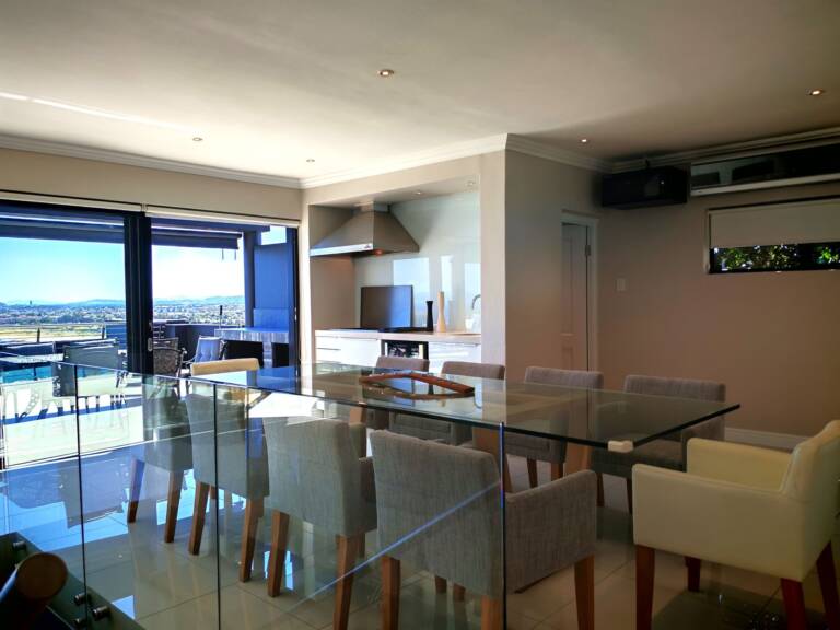 sugar beach penthouse gordons bay 24 dining table with indoor braai 1 768x576