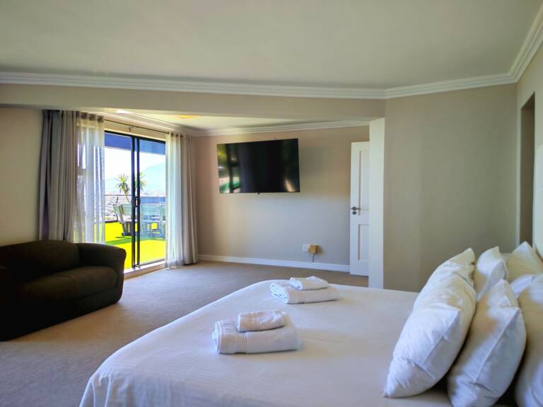 sugar beach penthouse gordons bay 35 bedroom with tv 1 768x576
