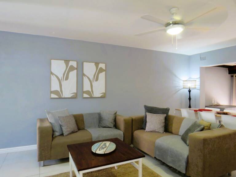 terrace on sea gordons bay 06 living room with comfortable furniture 768x577