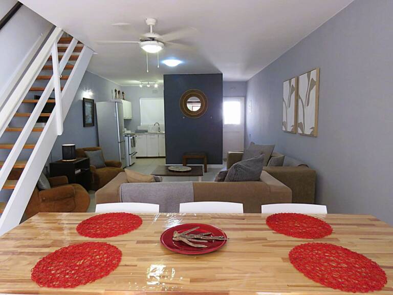 terrace on sea gordons bay 08 dining table with open plan living  768x576