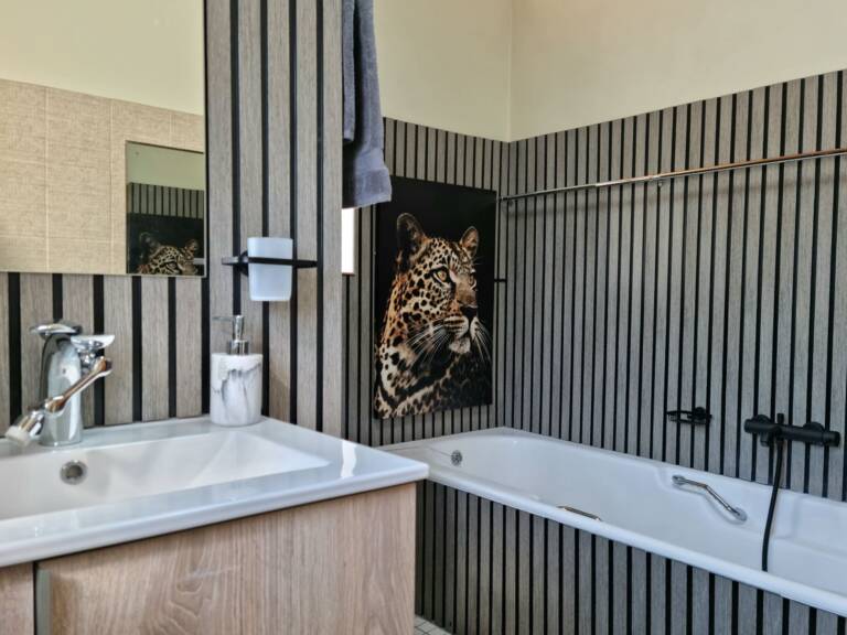 the loft gordons bay 21 bathroom with bath and shower 768x576