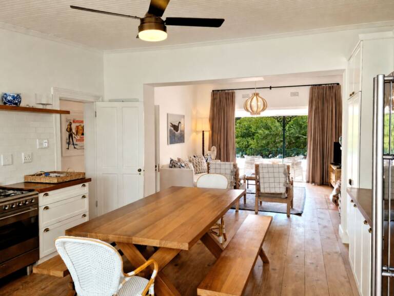 the milkwood cottage gordons bay 07 open plan living with dining and sea view 768x576