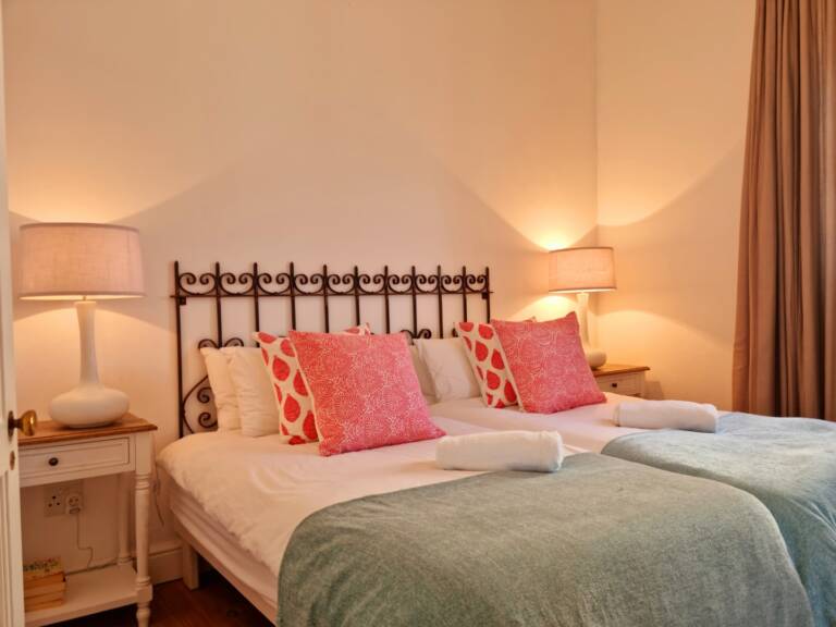 the milkwood cottage gordons bay 21 guest bedroom with quality linen 768x576