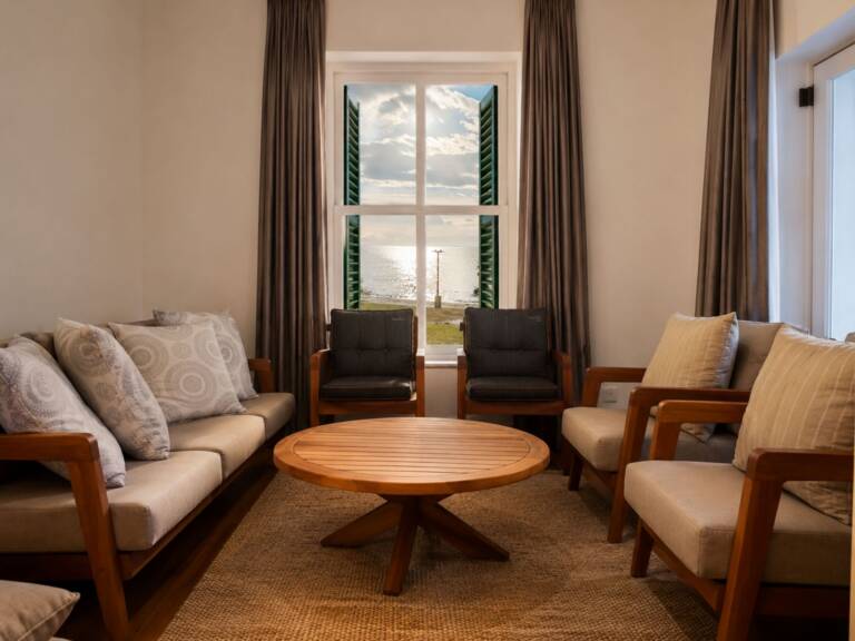 the milkwood cottage gordons bay 26 front room with veranda furniture 768x576