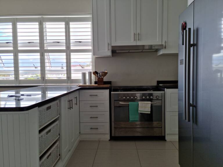 the penthouse gordons bay 27 open plan living with fully equipped kitchen 768x576