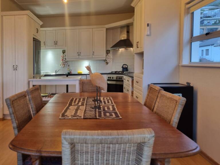 top flat gordons bay 10 open plan living with dining table 768x576