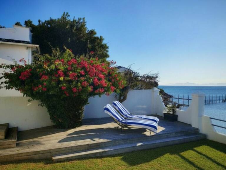 westbank private beach villa gordons bay 26 sea view garden with loungers 768x576