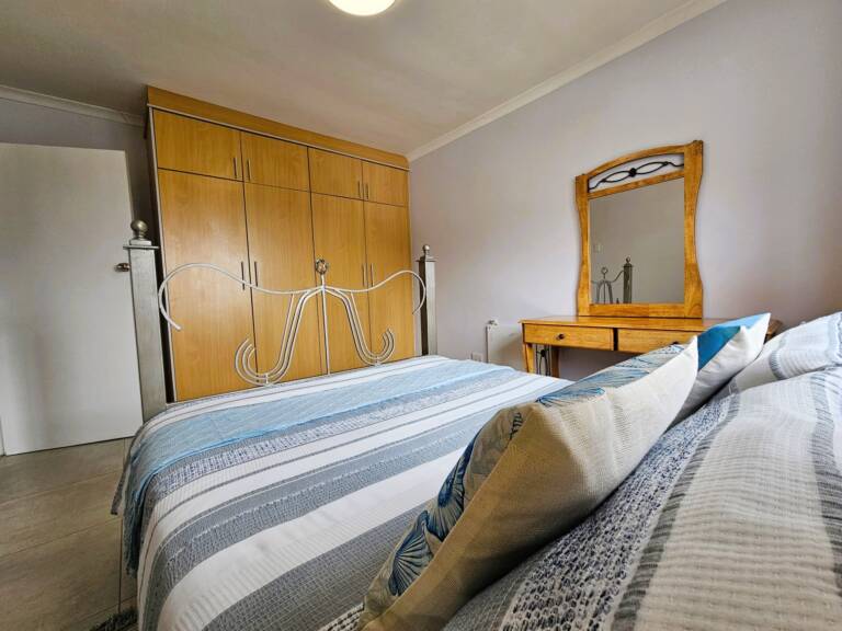 4 la corniche gordons bay 17 guest bedroom with wardrobes  768x576
