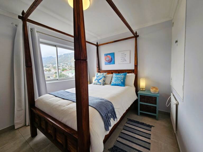 4 la corniche gordons bay 21 guest bedroom with poster bed 768x576